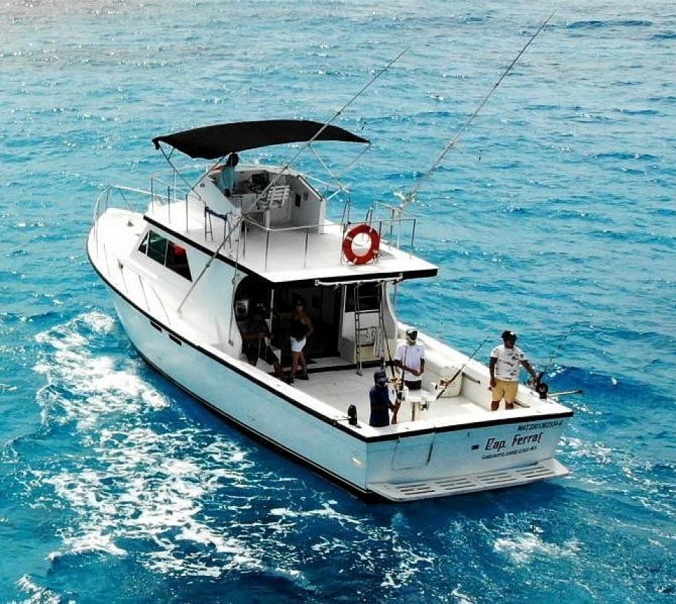 YATE DE PESCA FISHING BOAT 48 ft foot pies 14 pax passengers invitados pasajeros barato cheap all included all inclusive cancun quintana roo zona hotelera